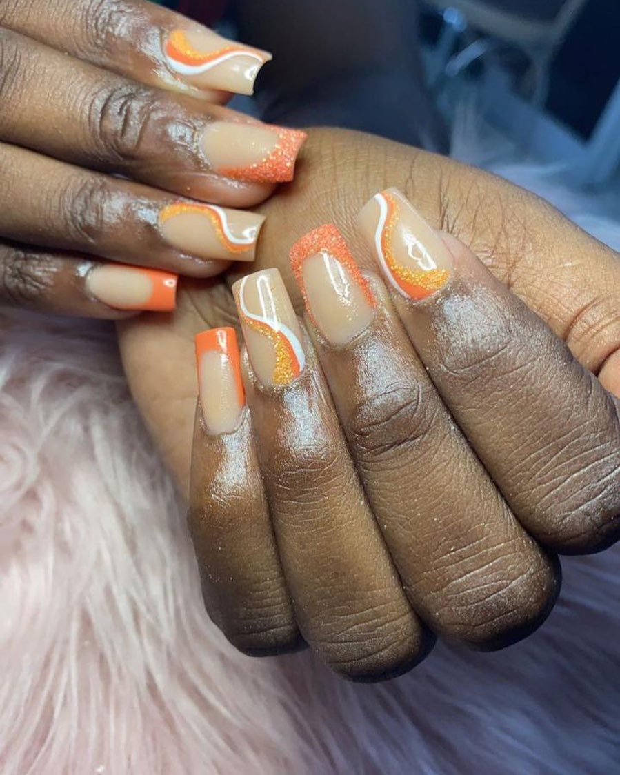 Nail Art with Orange Accents