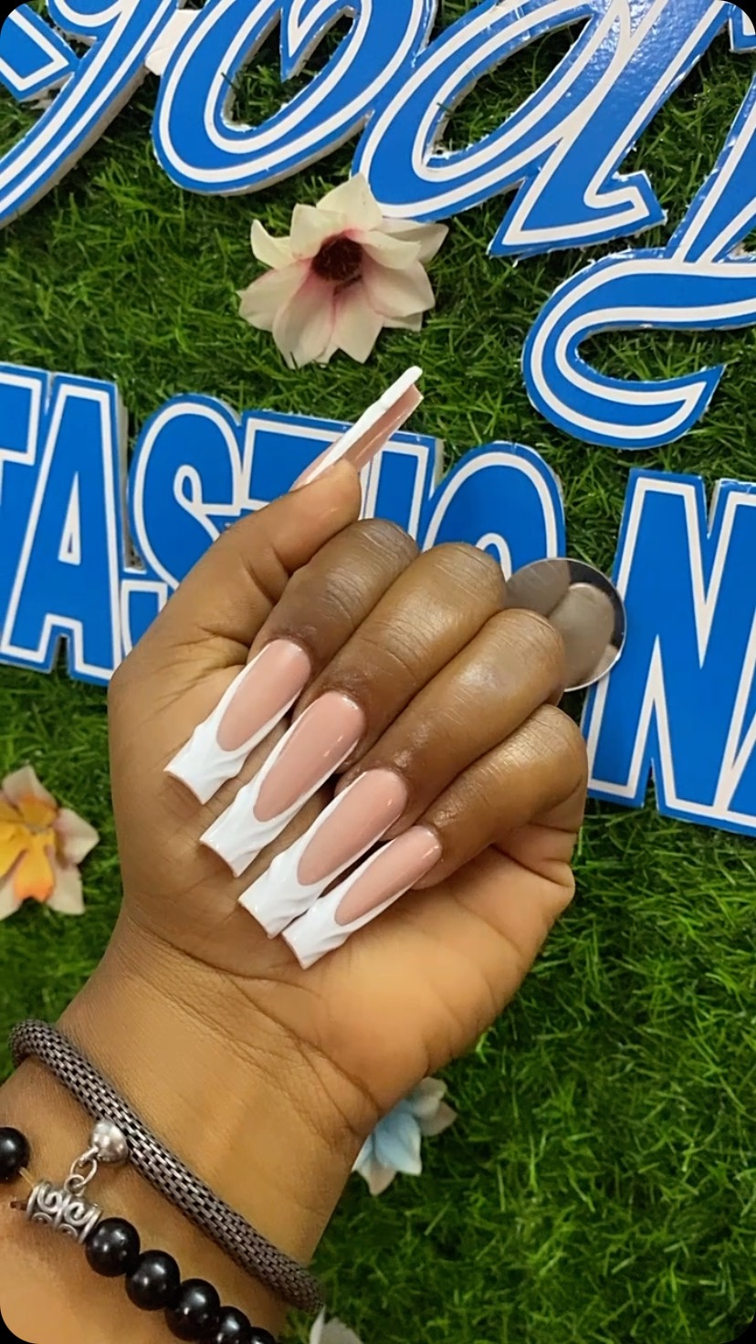 Artistic Nude and White Stiletto Nails