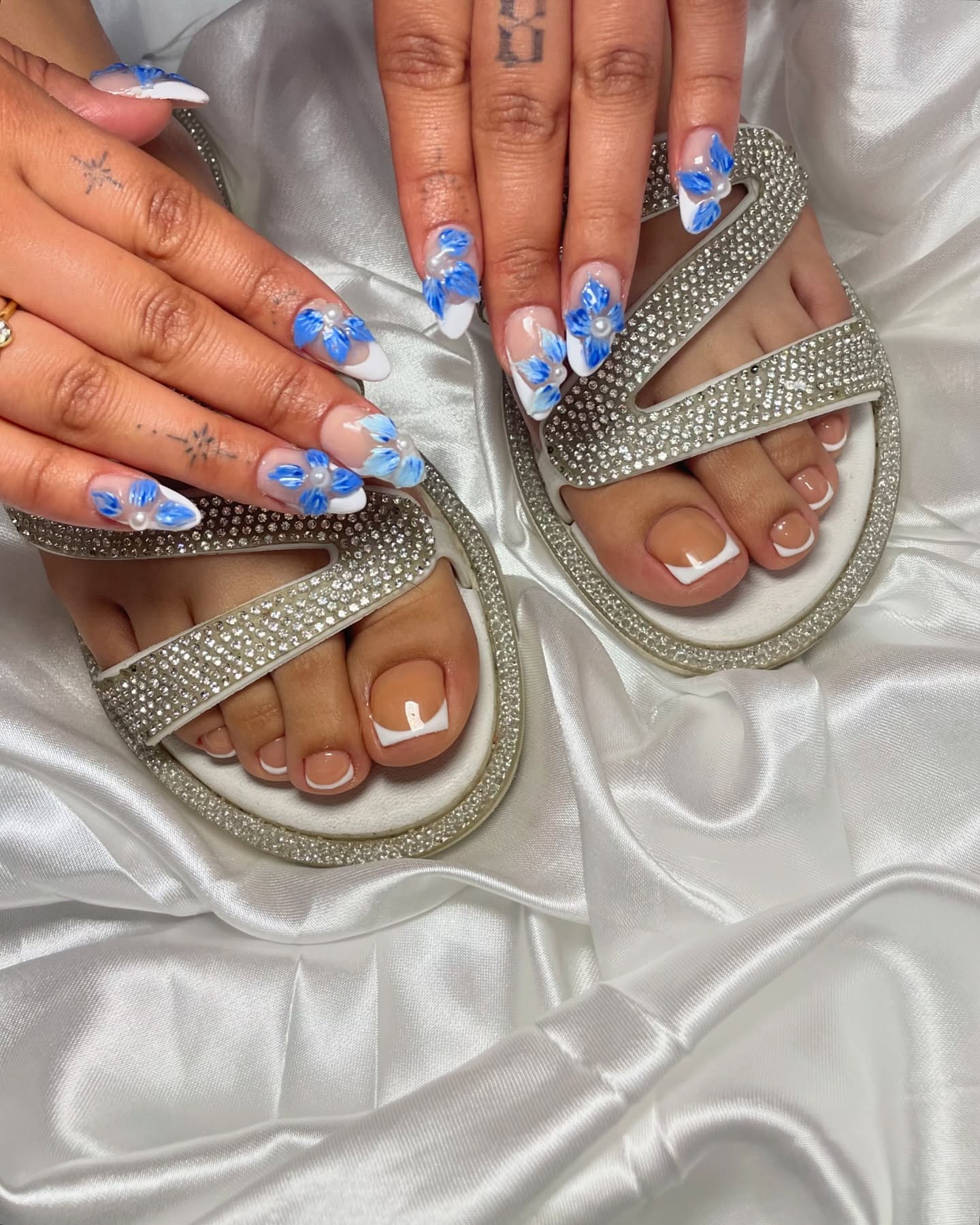 Nail Art with Blue Floral Designs