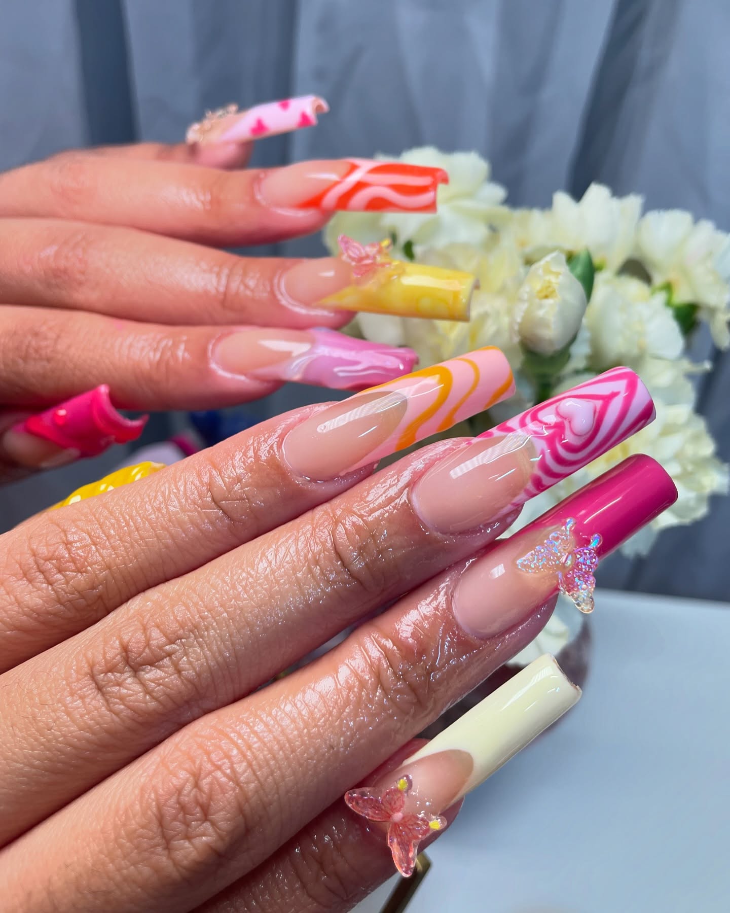 Colorful Long Artistic Nails with Butterfly Charms