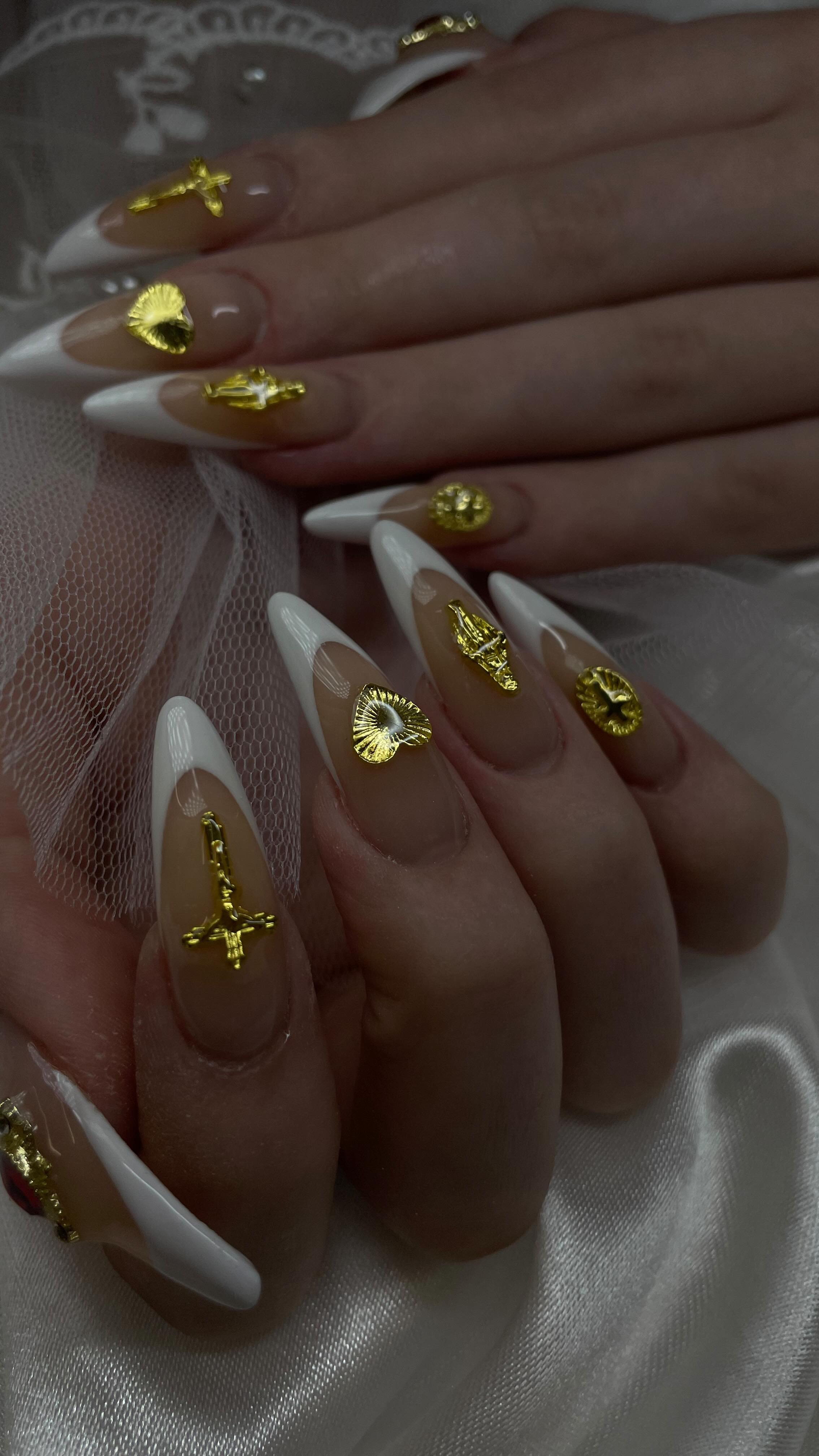 Elegant Stiletto Nails with Gold Accents