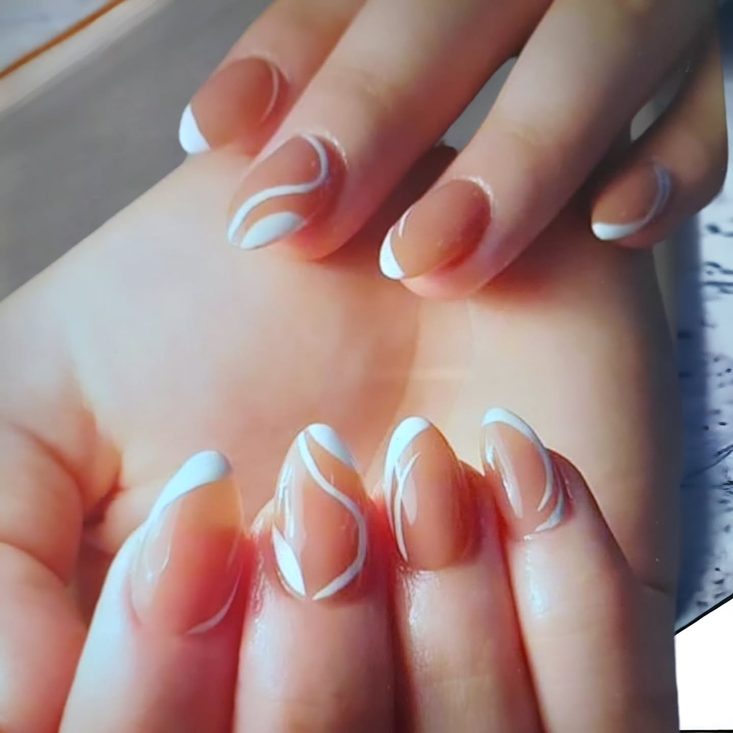 Elegant Nude and White Nail Design