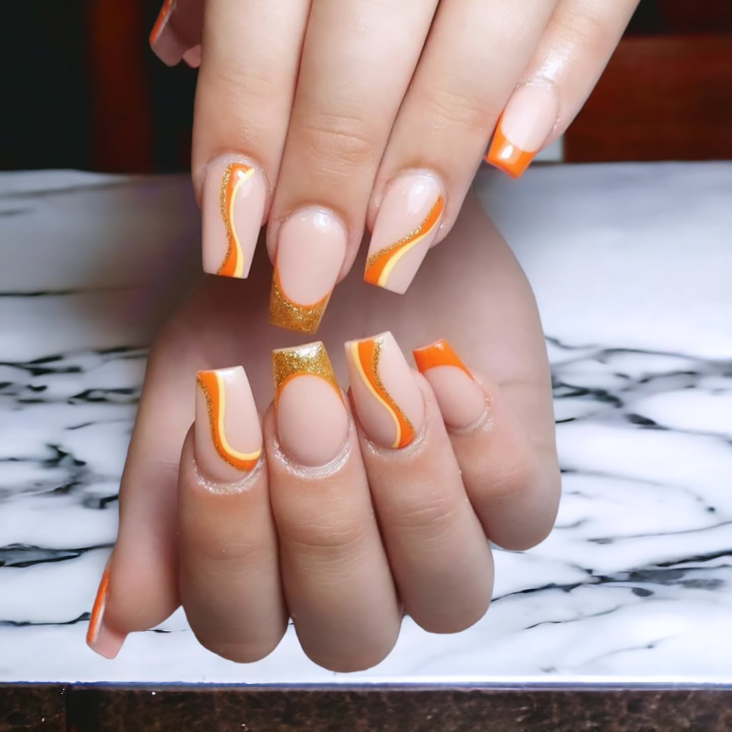 Stylish Orange and Gold Nails