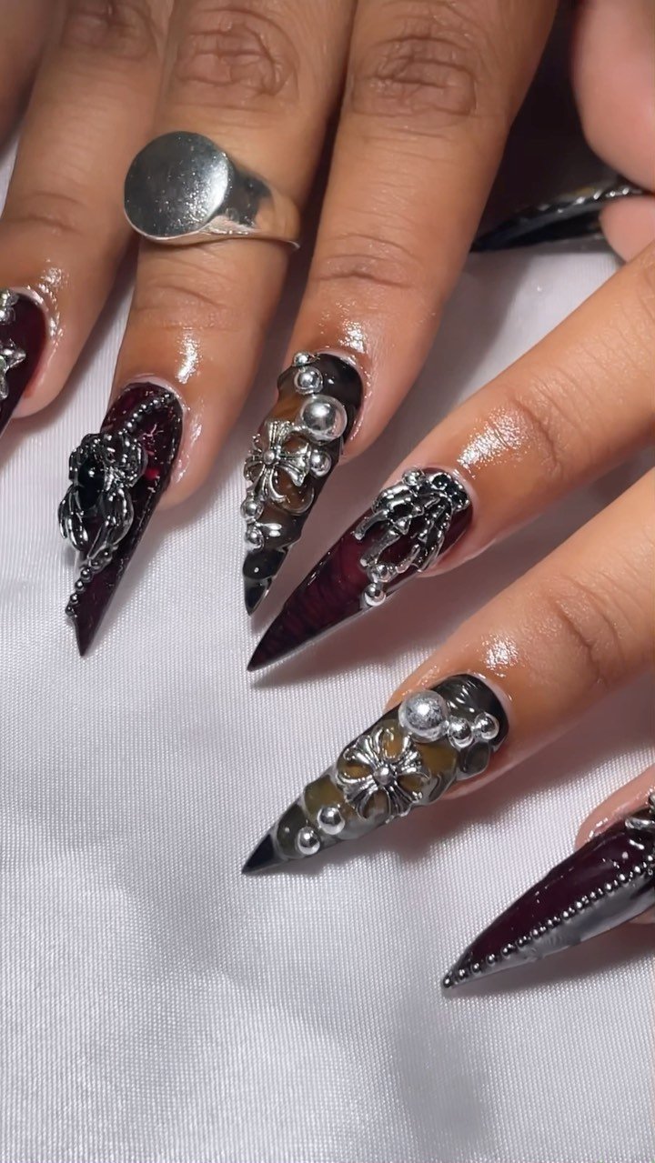 Aesthetic Stiletto Nails with Silver Accents