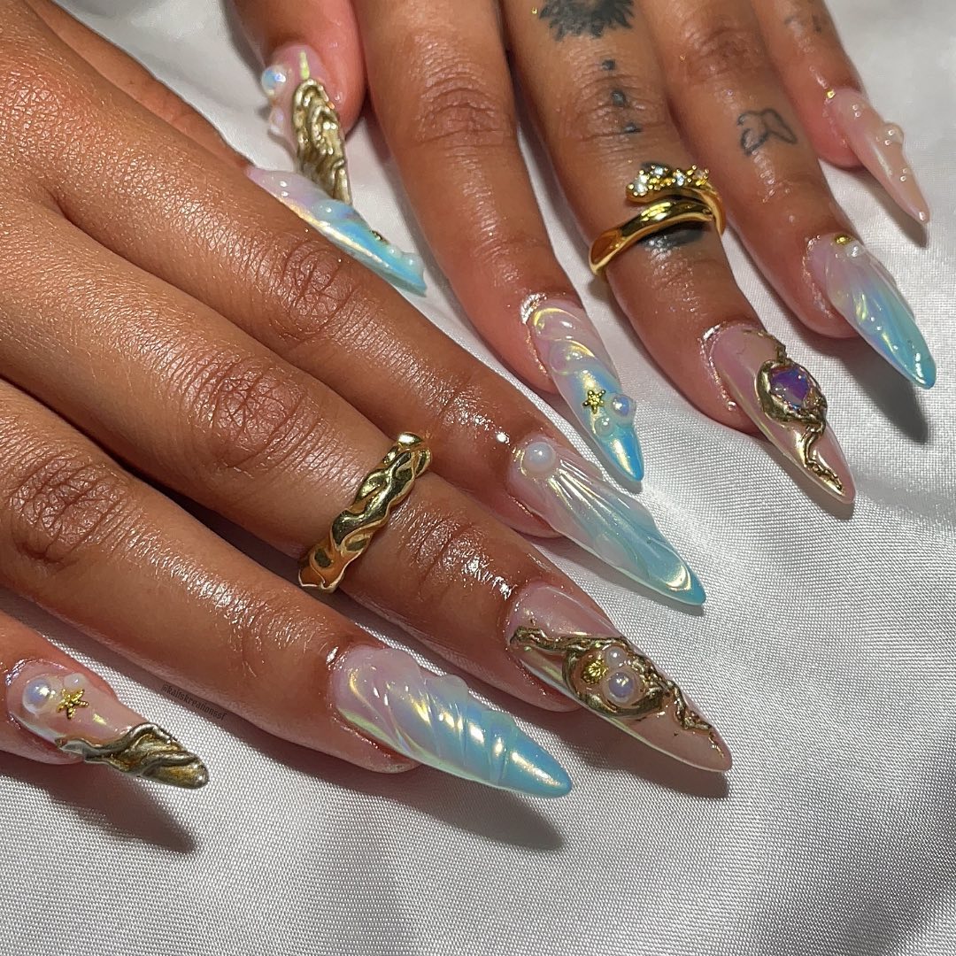 Artistic Stiletto Nails with Gems