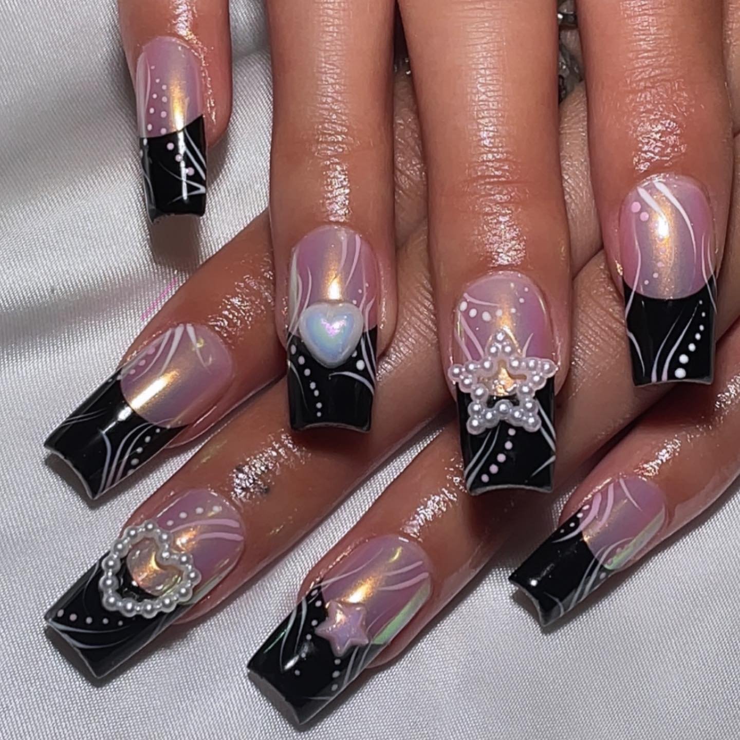 Artistic Black and Pink Nail Design