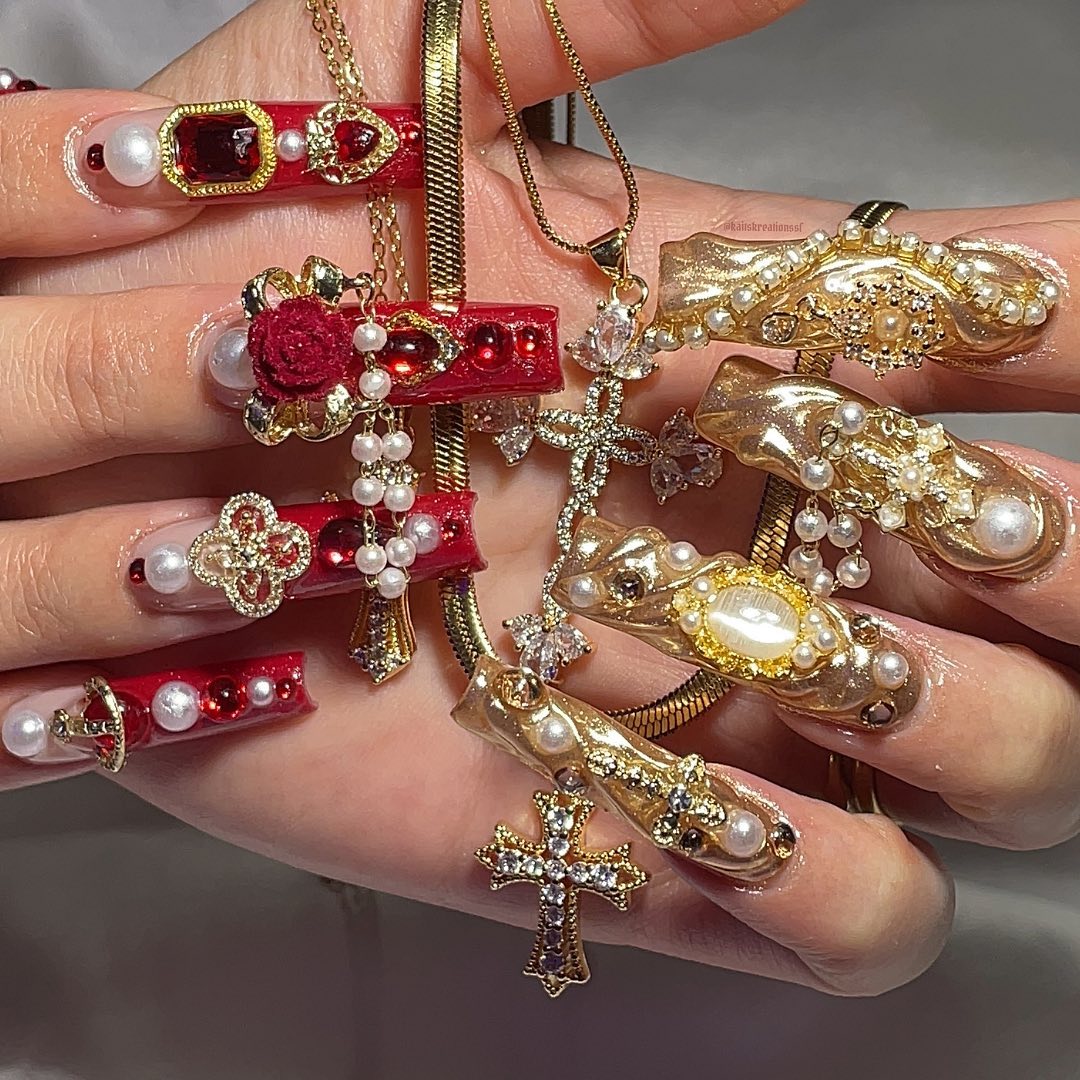 Extravagant Nail Art with Gold and Red