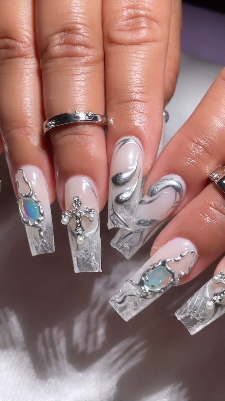 Artistic Clear Nail Design with Gems