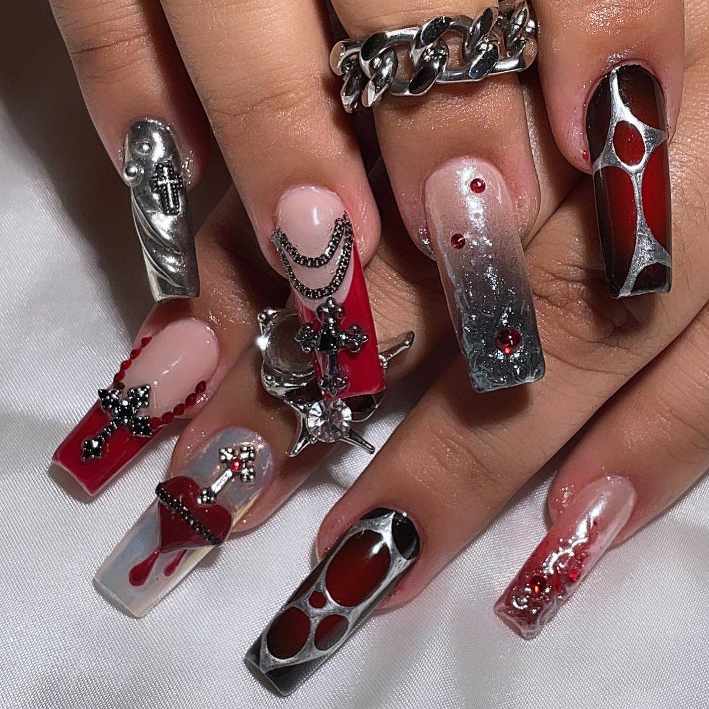 Artistic Red and Silver Nails