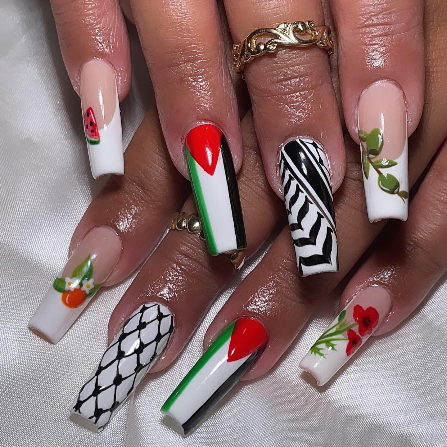 Artistic Nail Design with Patterns and Fruits