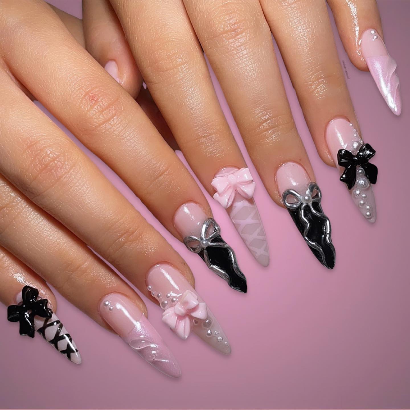Artistic Pink and Black Bows Nail Art