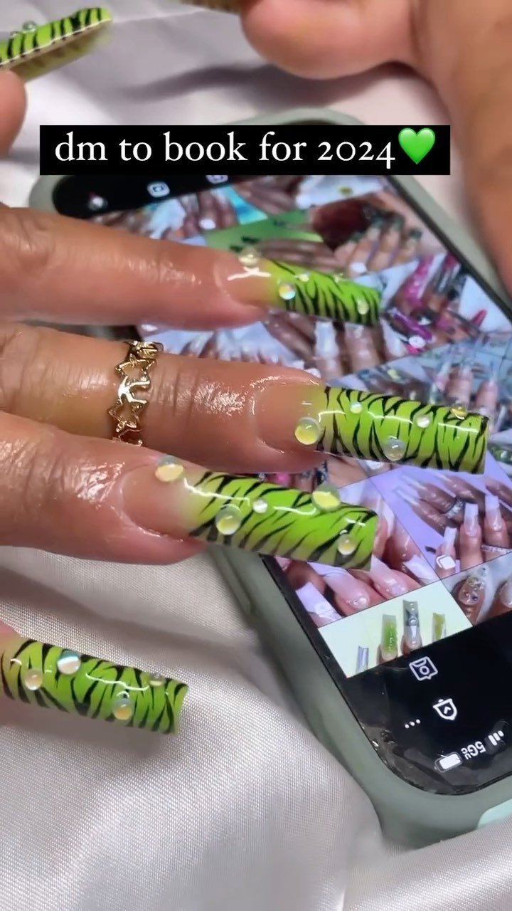 Vibrant Green Tiger Print Nails
