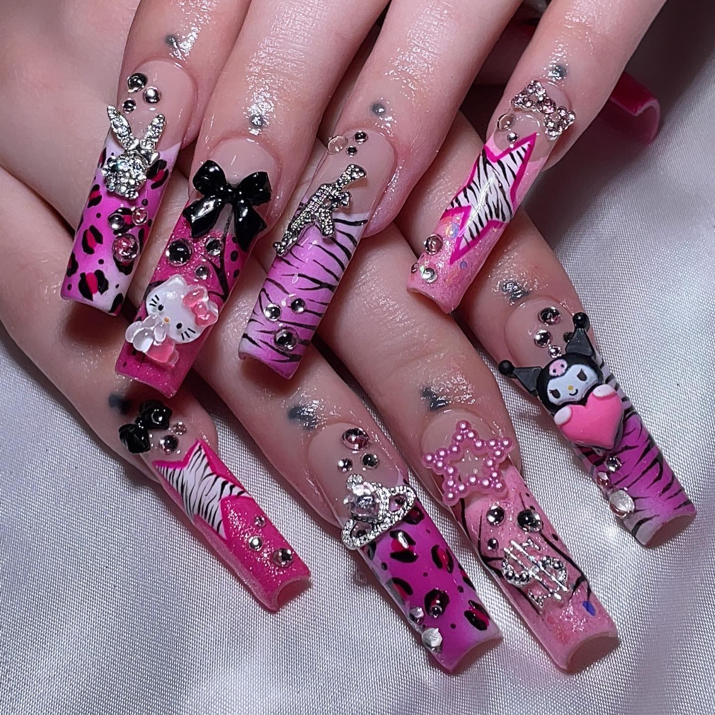 Vibrant Pink Artistic Nails with Gems