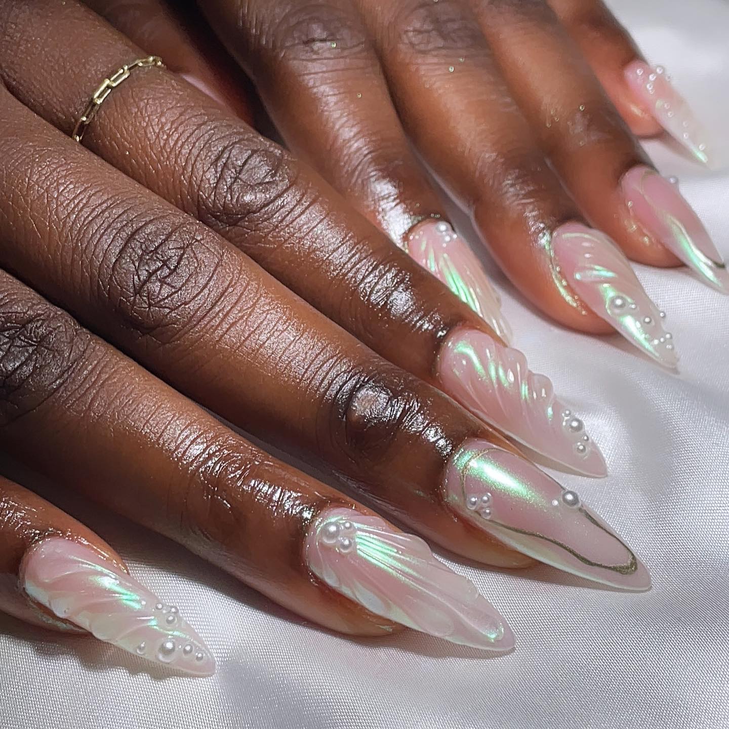Elegant Stiletto Nails with Pearls