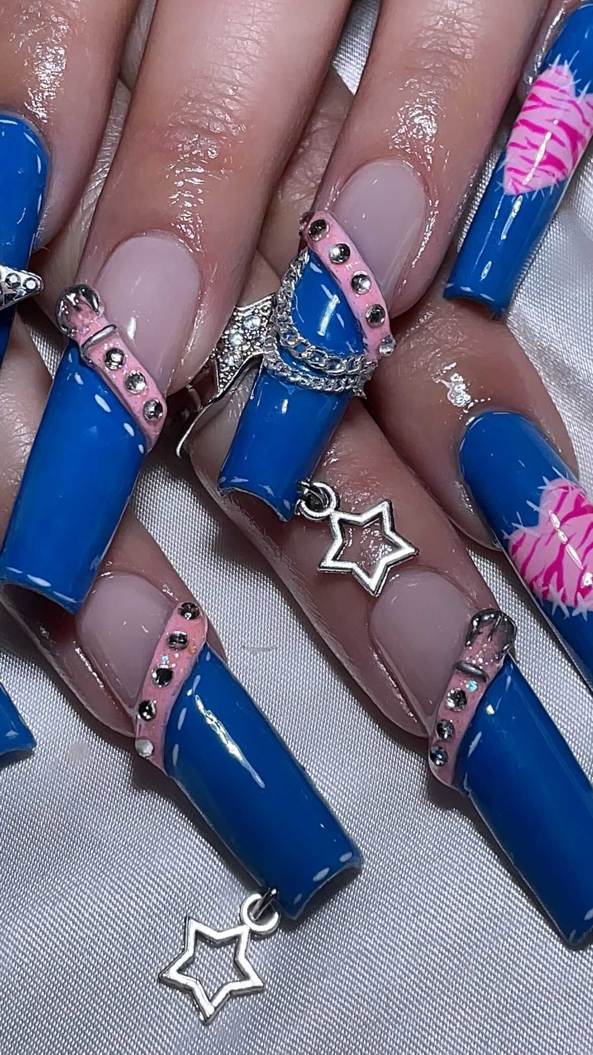 Stylish Blue and Pink Star Nails