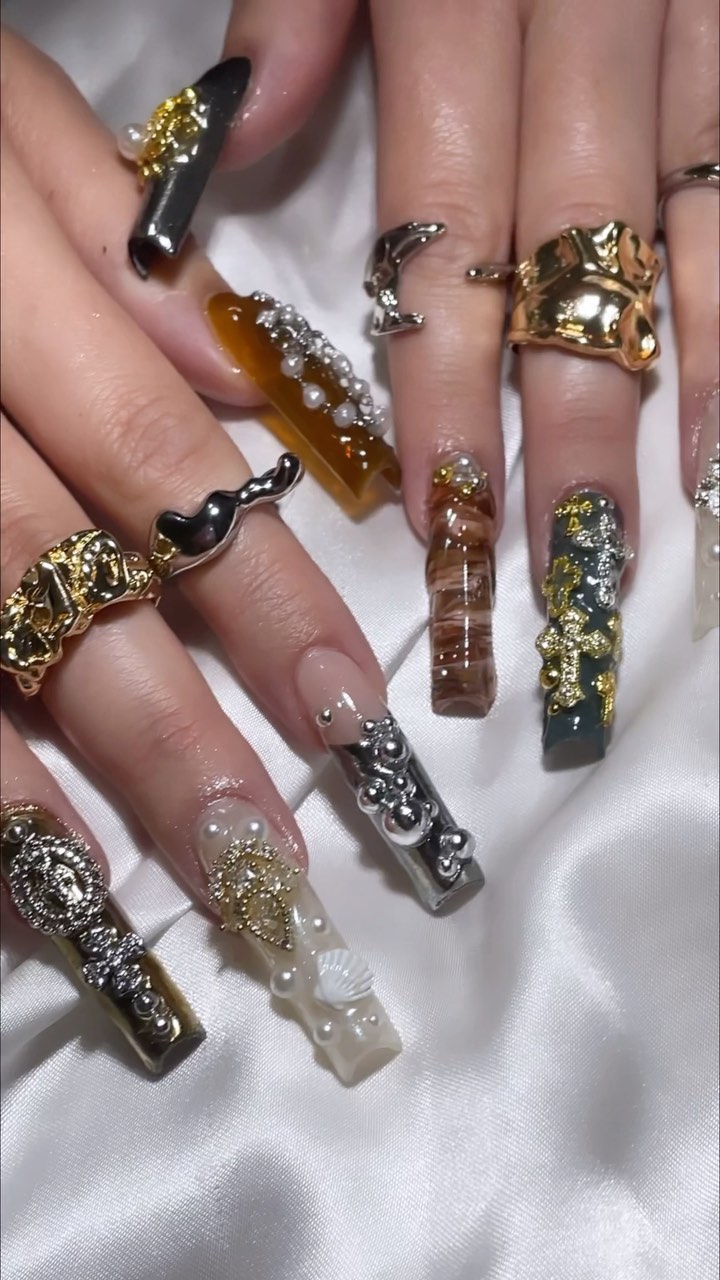Stylish Artistic Nails with Gem Accents