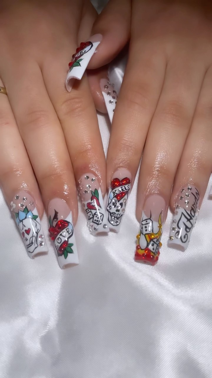 Artistic Nail Design with Skull and Roses