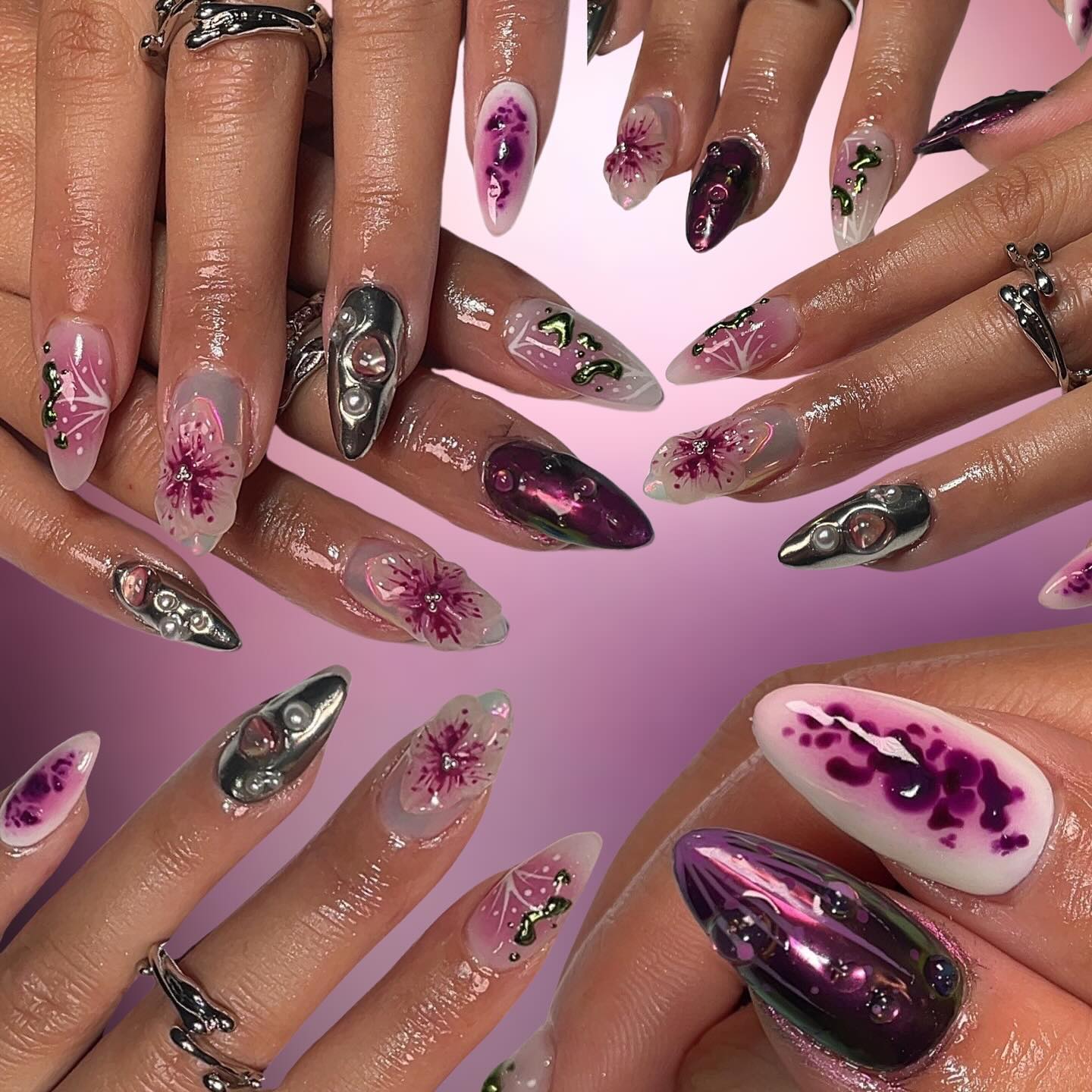Artistic Purple and Pink Floral Nails