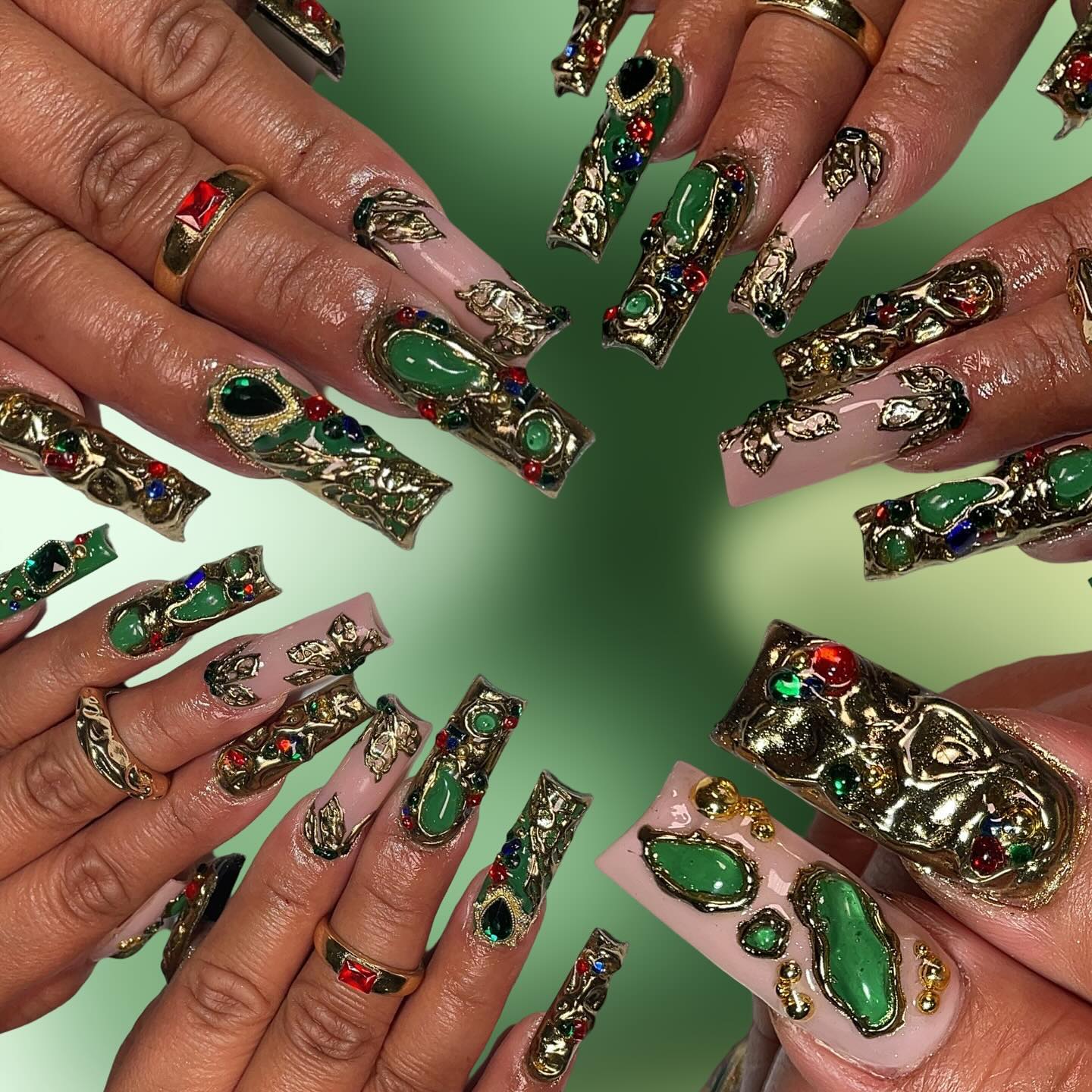 Artistic Green and Gold Nails with Gems