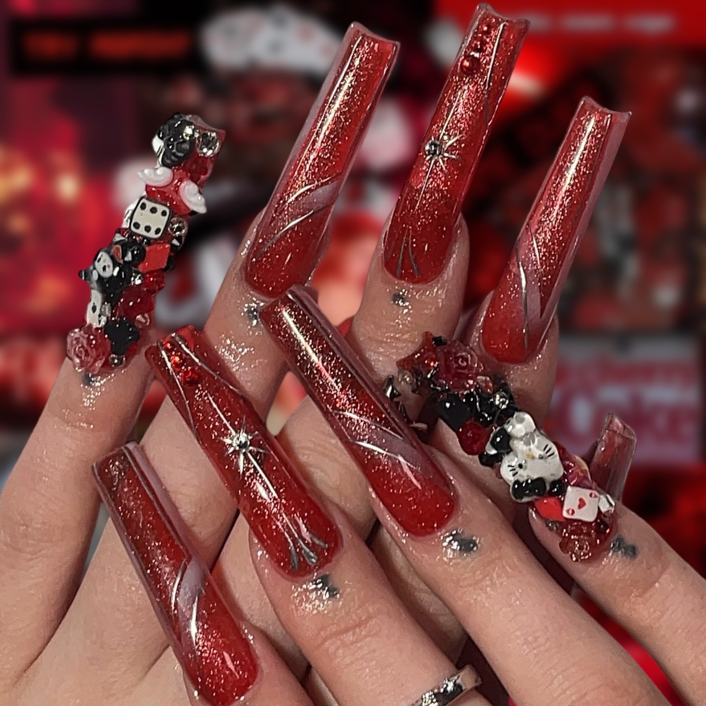 Glittery Red Nails with Charms