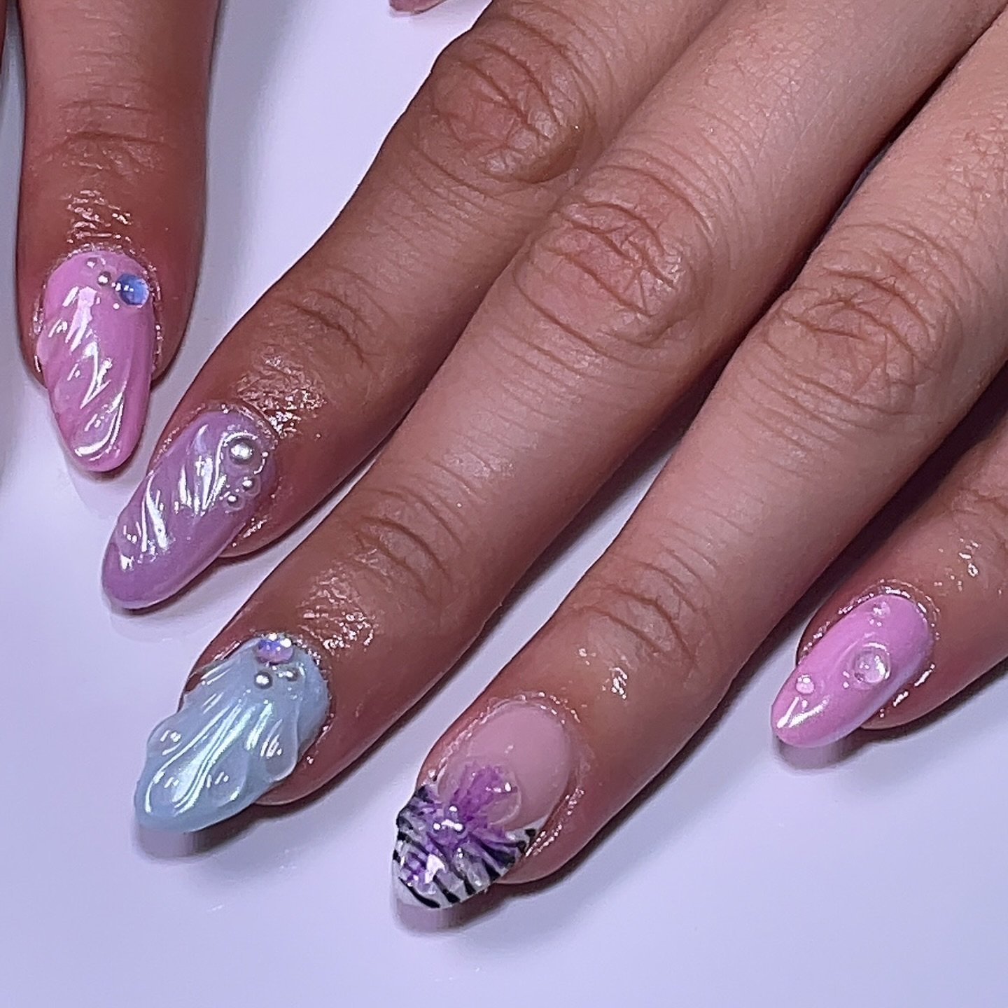 Artistic Pink and Blue Nail Design