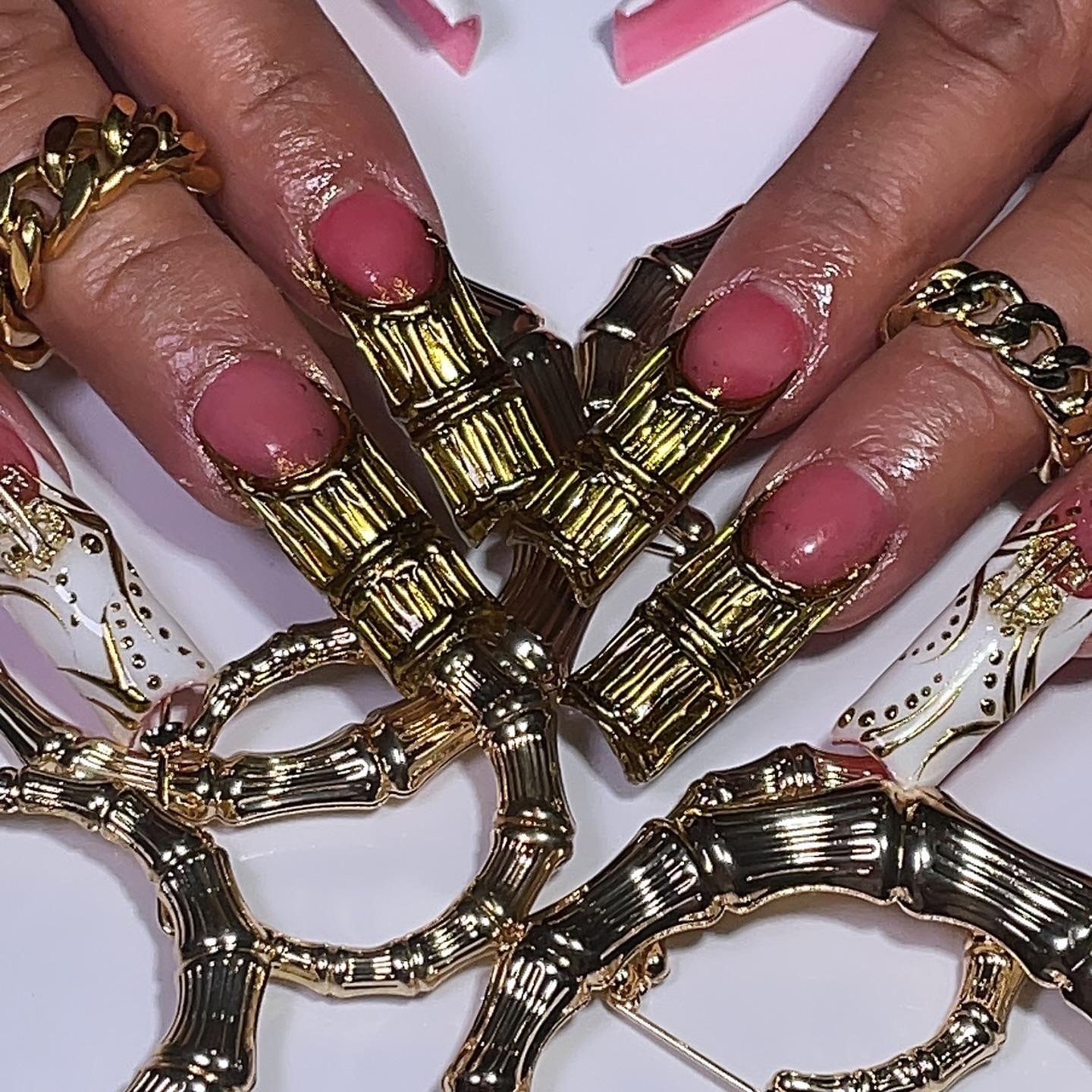 Artistic Gold and Nude Nails
