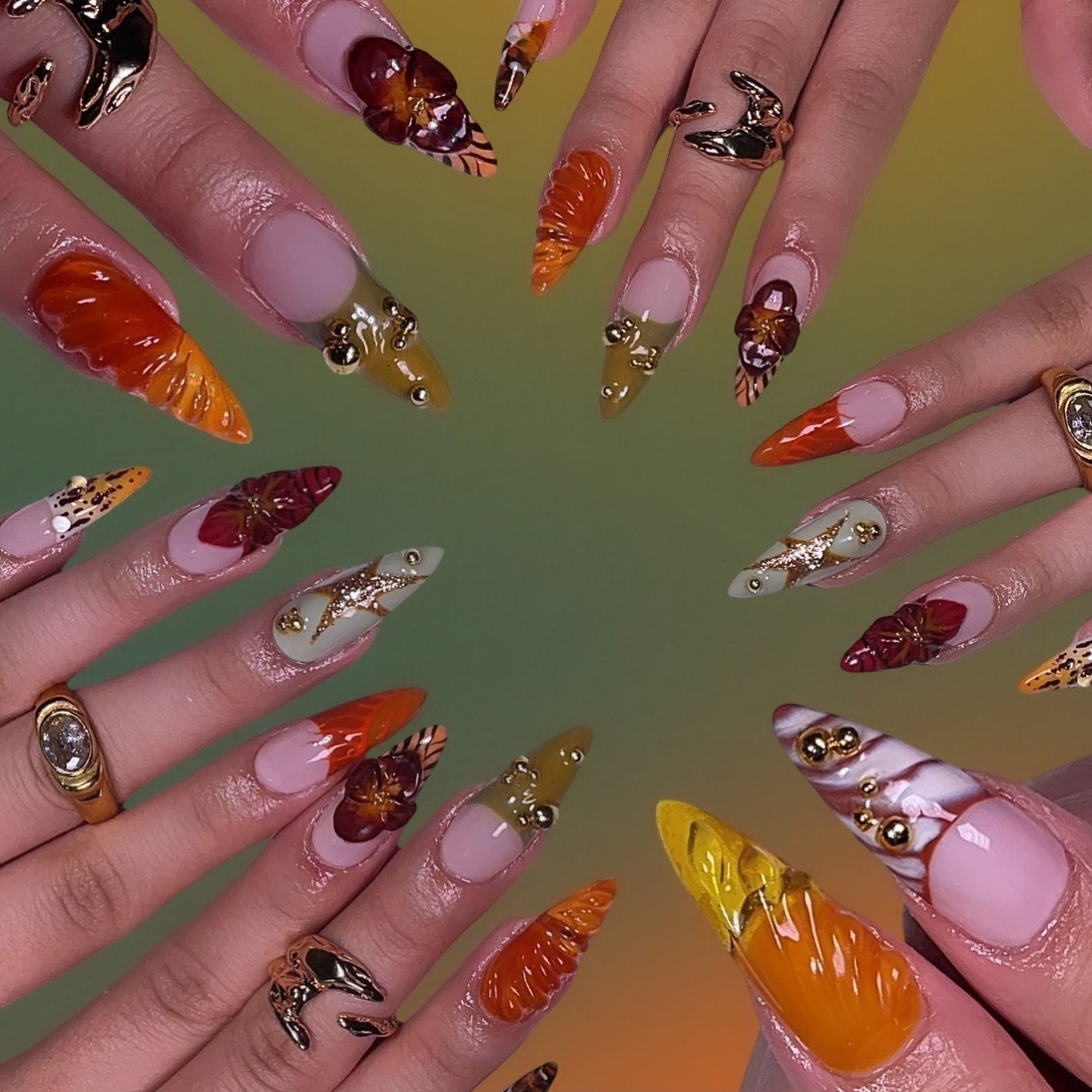 Artistic Stiletto Nails with Charm Details