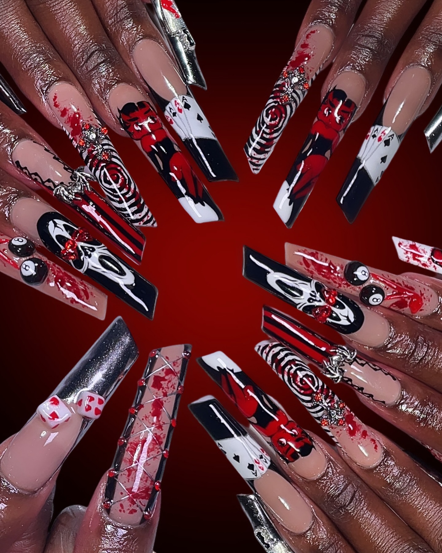 Artistic Blood Red and Black Nail Design