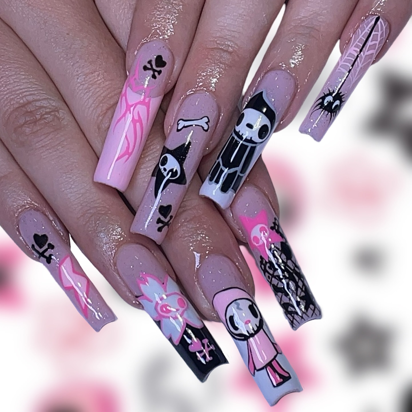 Artistic Nails with Skull and Heart Designs