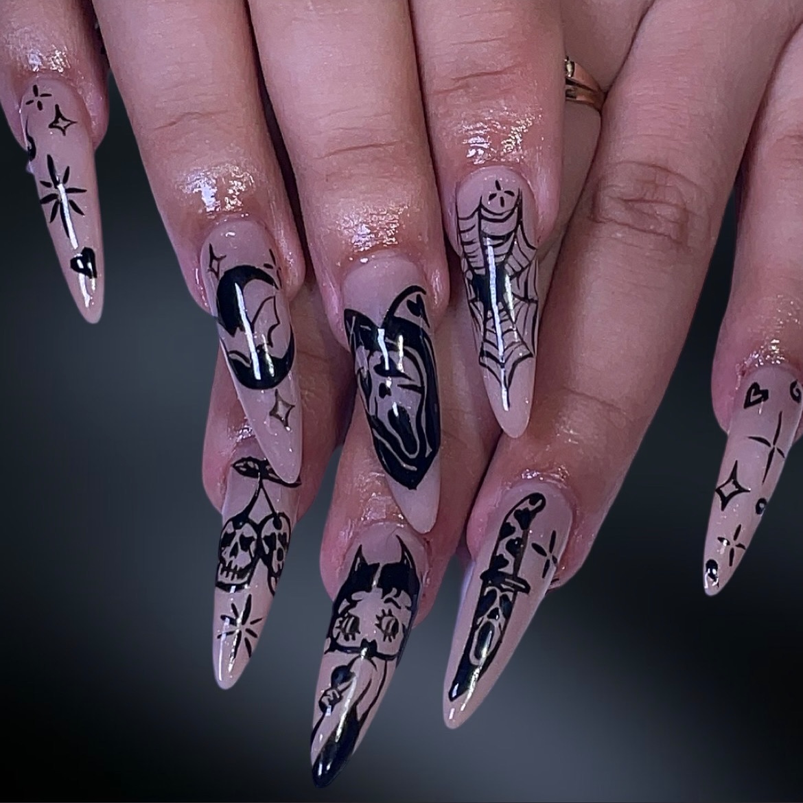 Artistic Black and Nude Nail Designs