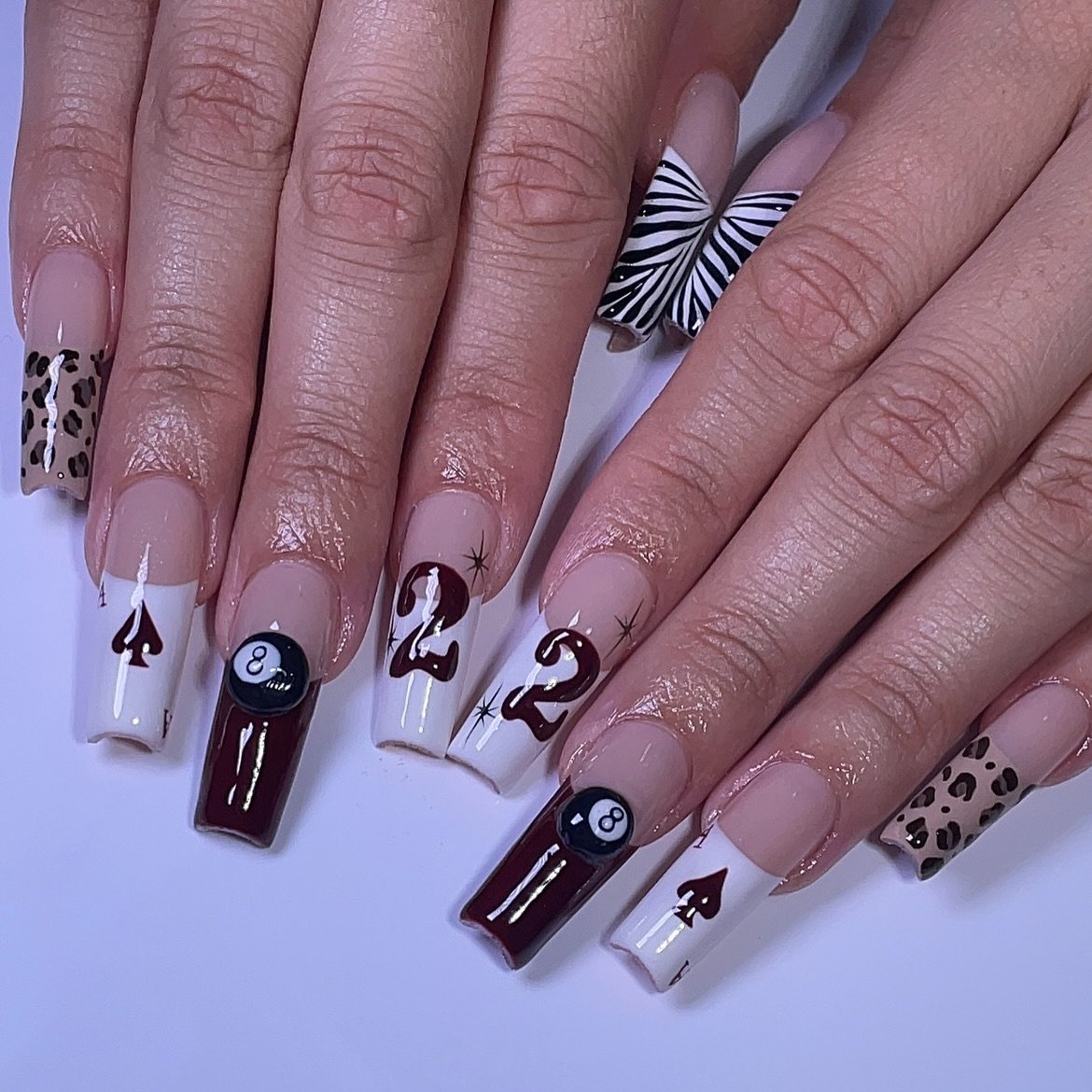 Artistic Nail Design with Patterned Elements