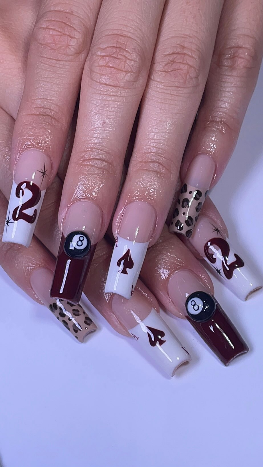 Artistic Nail Design with Numbers and Patterns