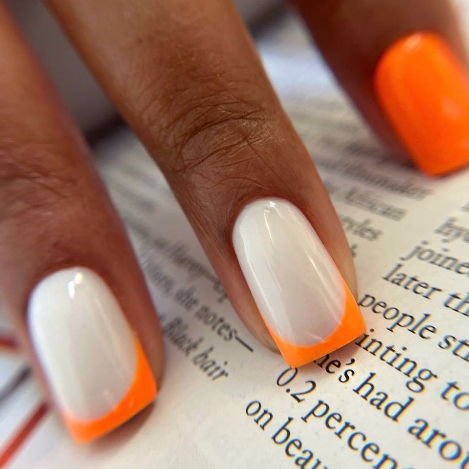 Stylish Orange and White Nails