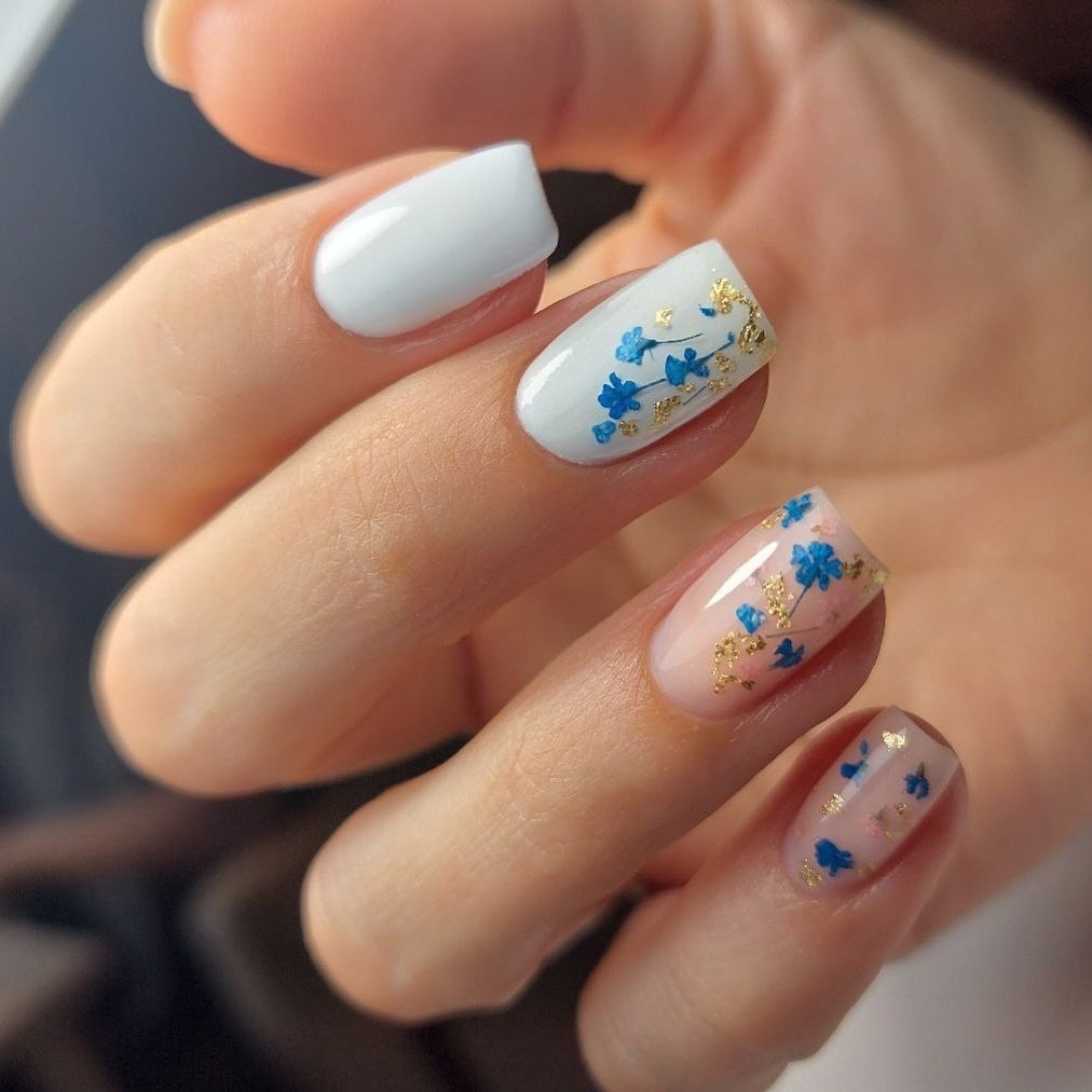 Floral Nail Art with Gold Accents