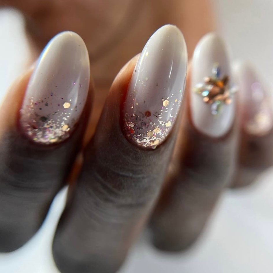 Glittery Nude Nails with Gems