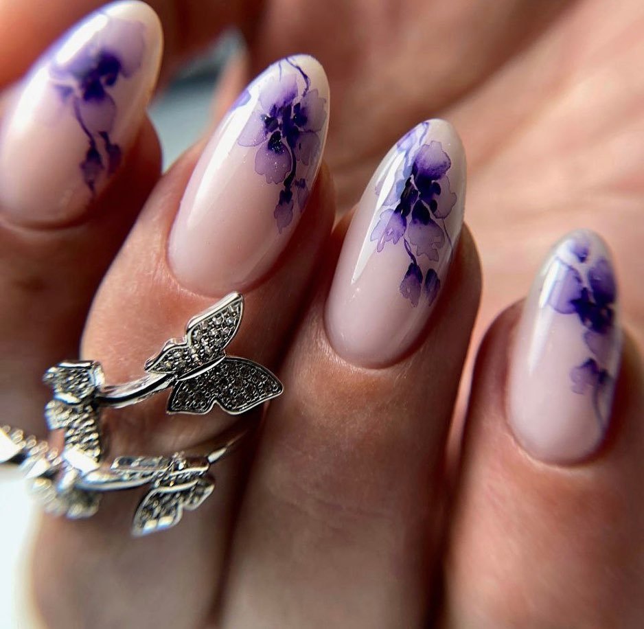 Artistic Purple Floral Nail Design