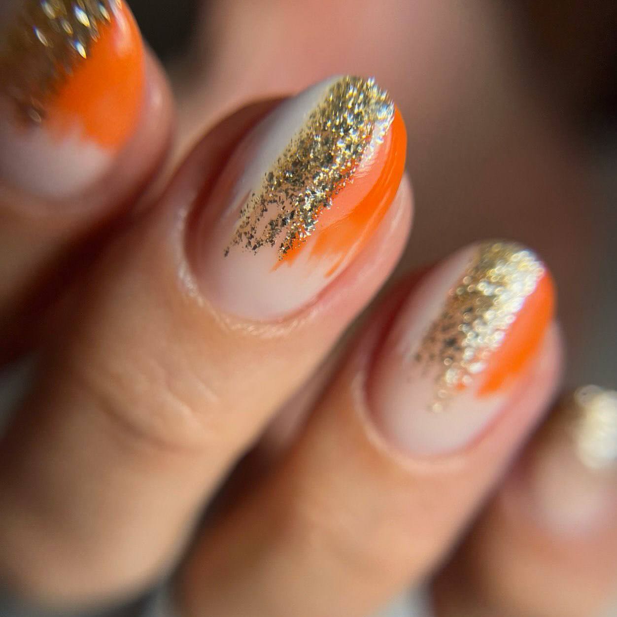 Artistic Orange Glitter Nails