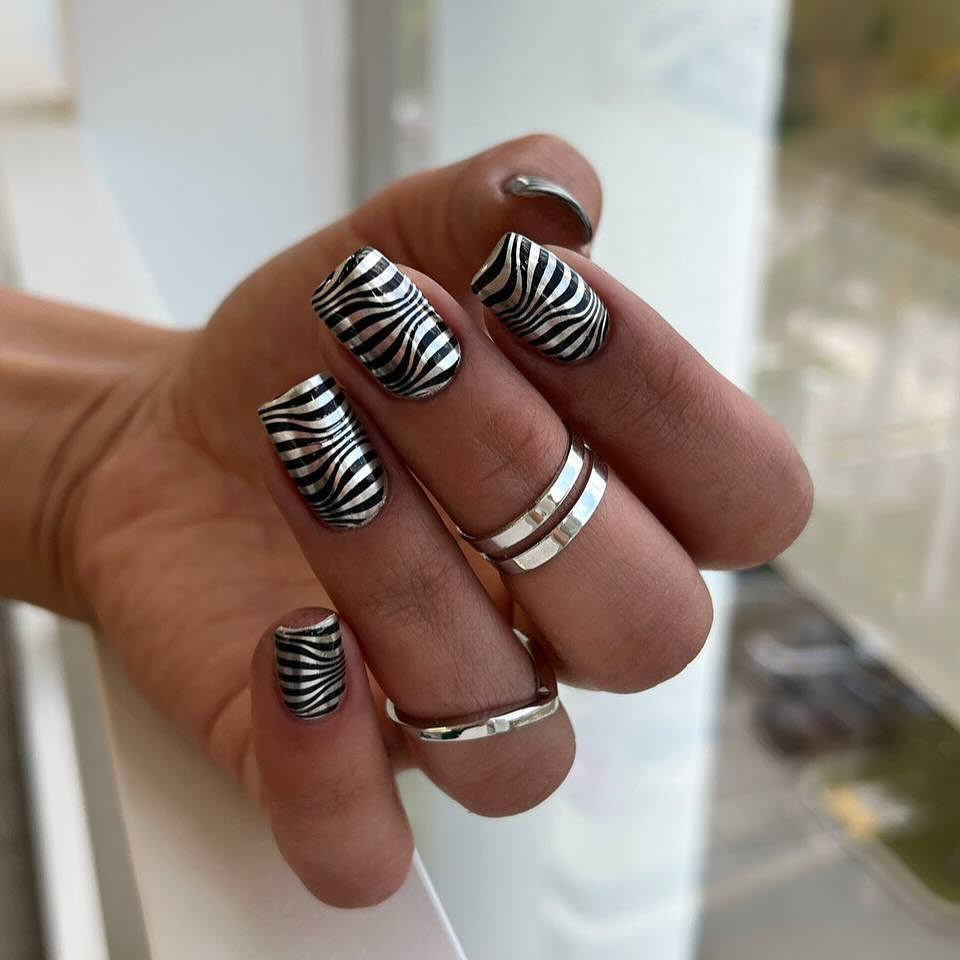 Stylish Black and White Striped Nails