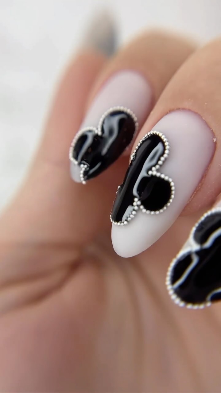 Artistic Black and Nude Nails