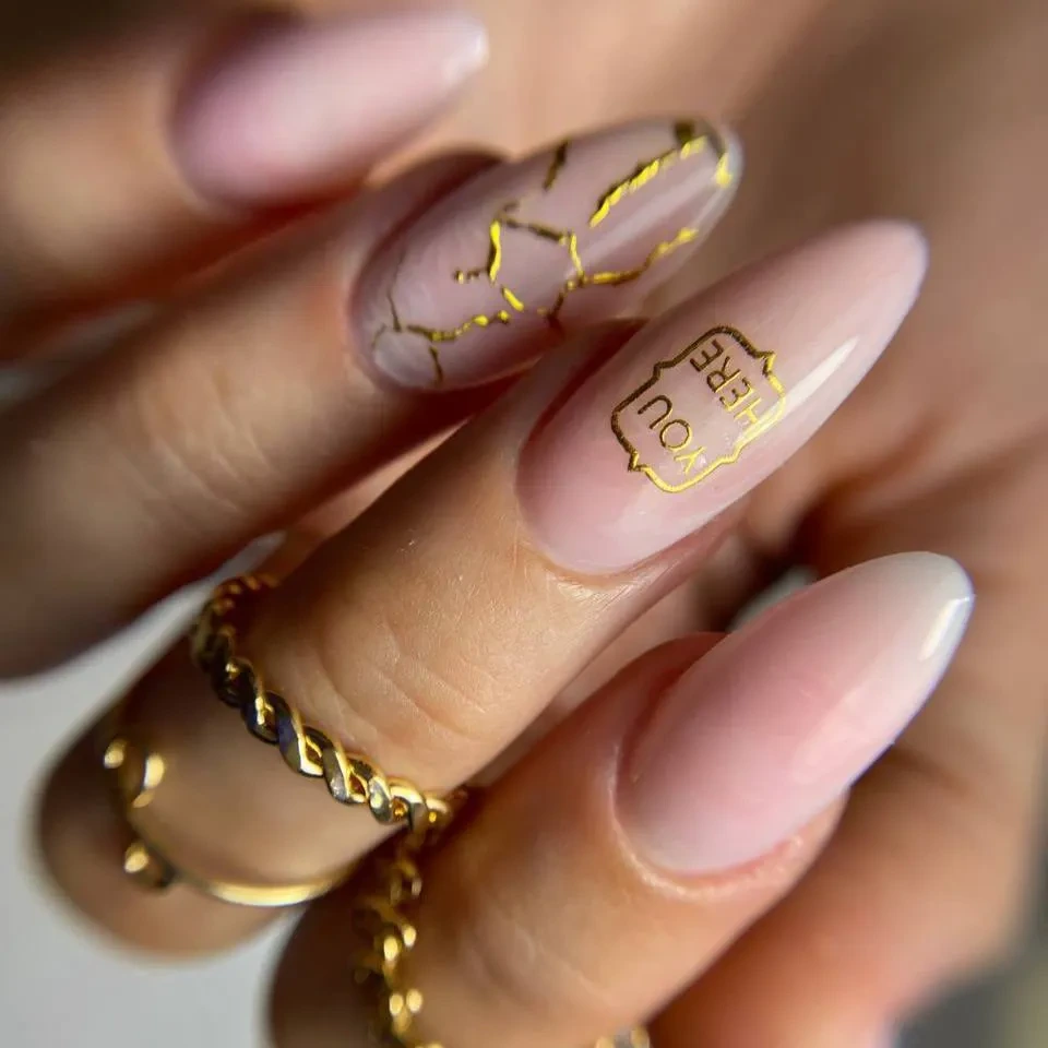 Elegant Gold and Nude Nails