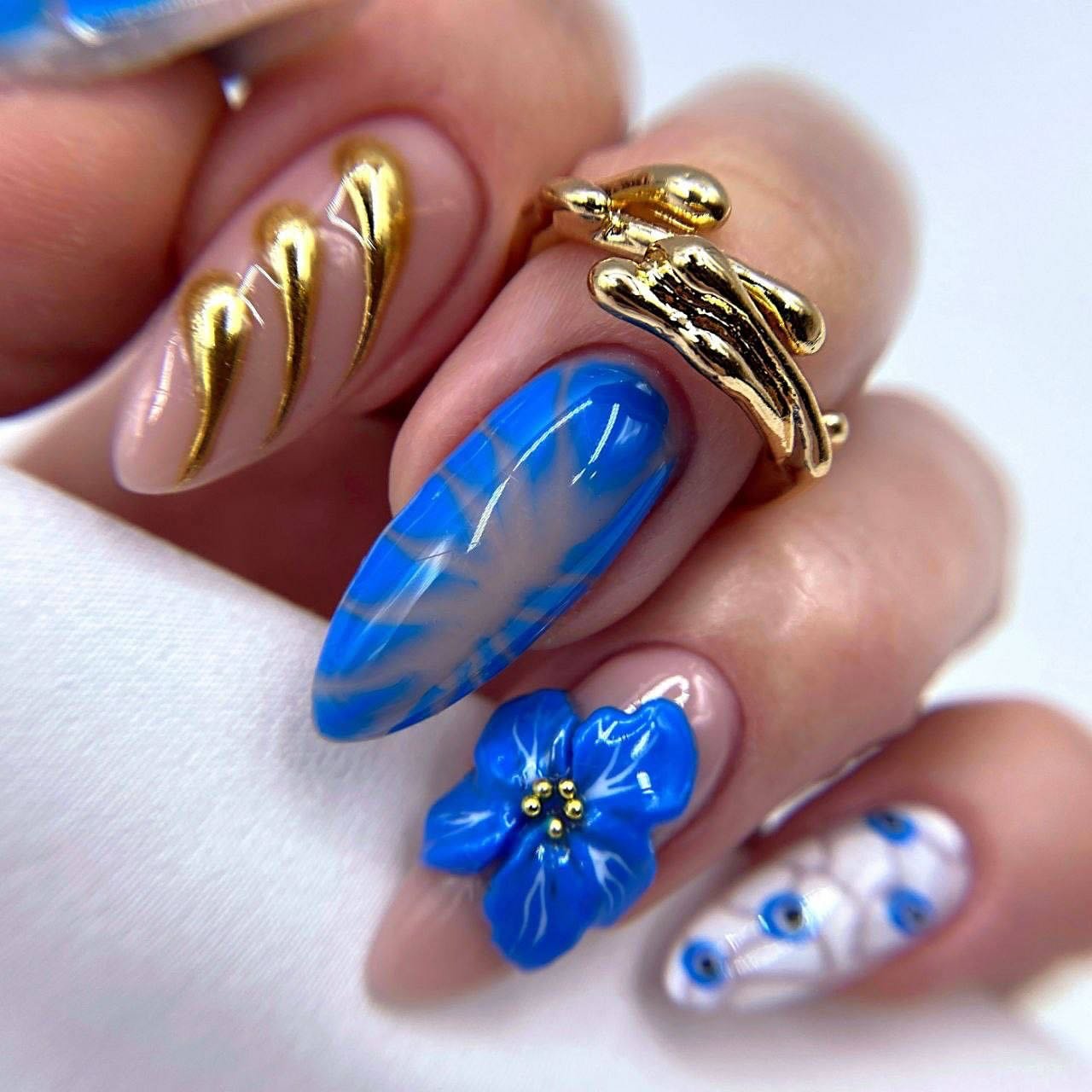 Artistic Blue Nail Design