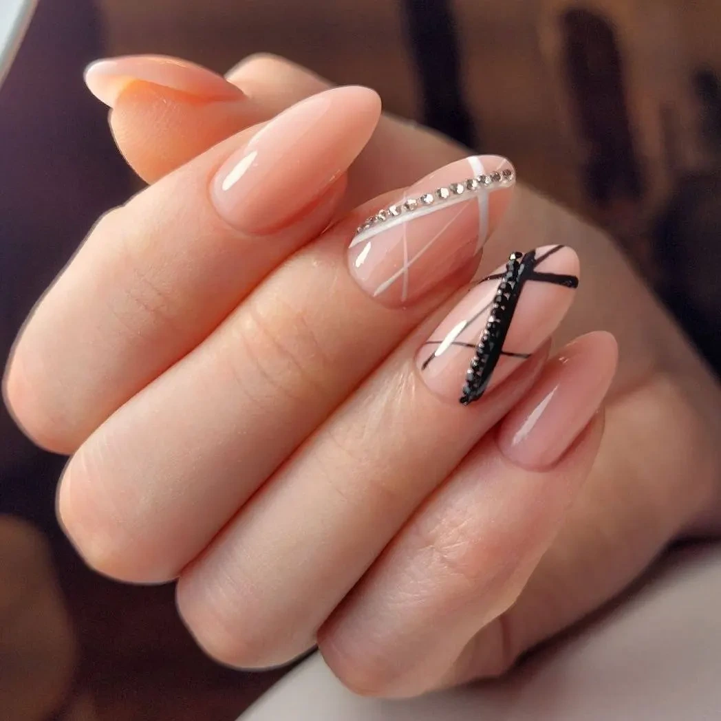 Elegant Nude and Black Nail Design