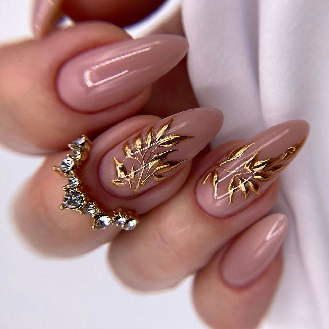 Elegant Gold Leaf Design on Nude Nails