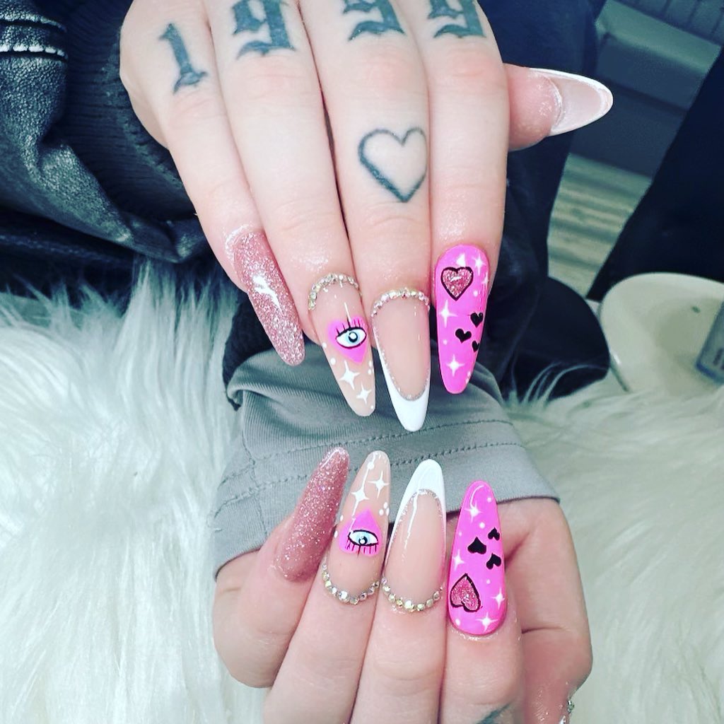 Artistic Pink and White Nail Design