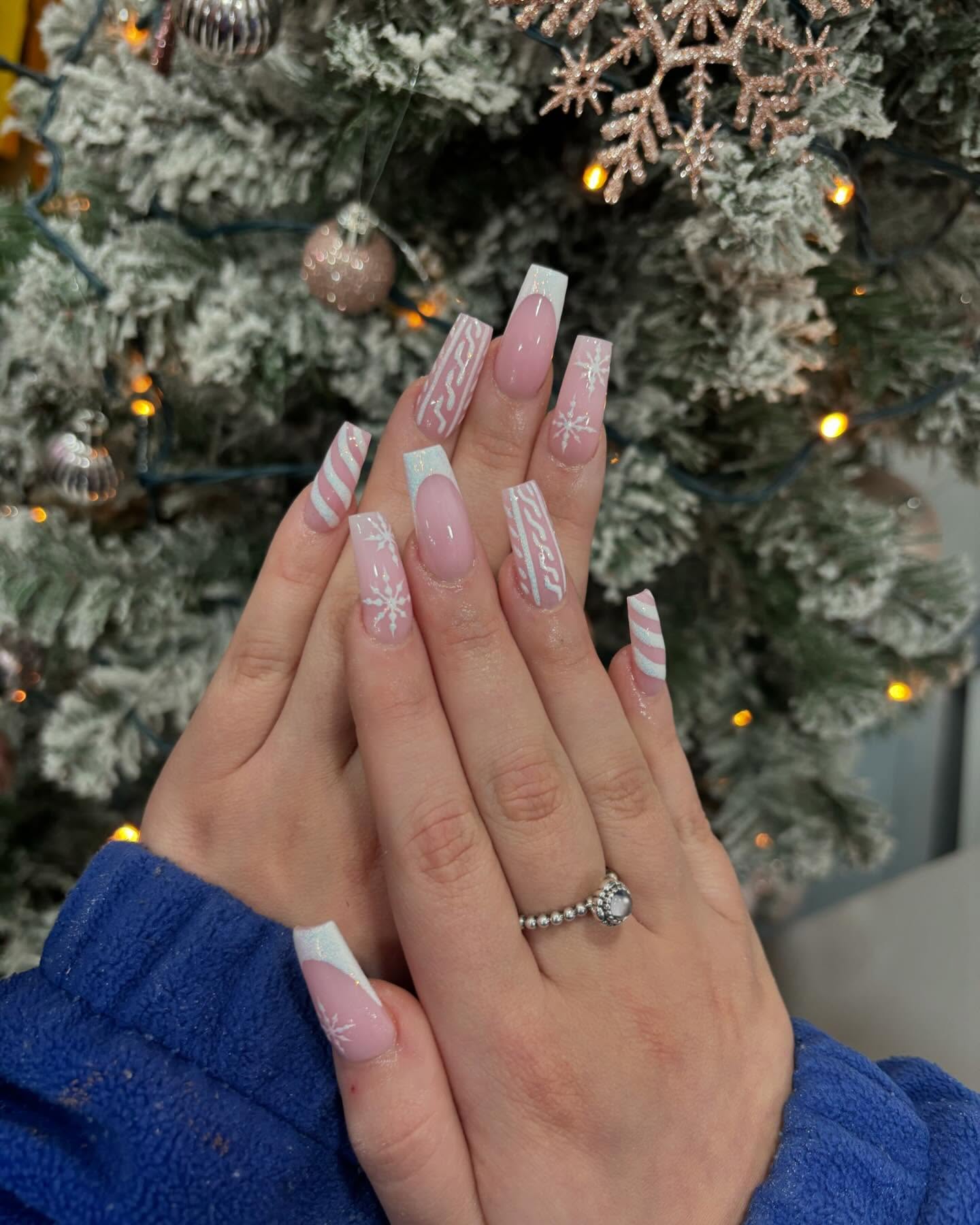 Artistic Pink and White Holiday Nails