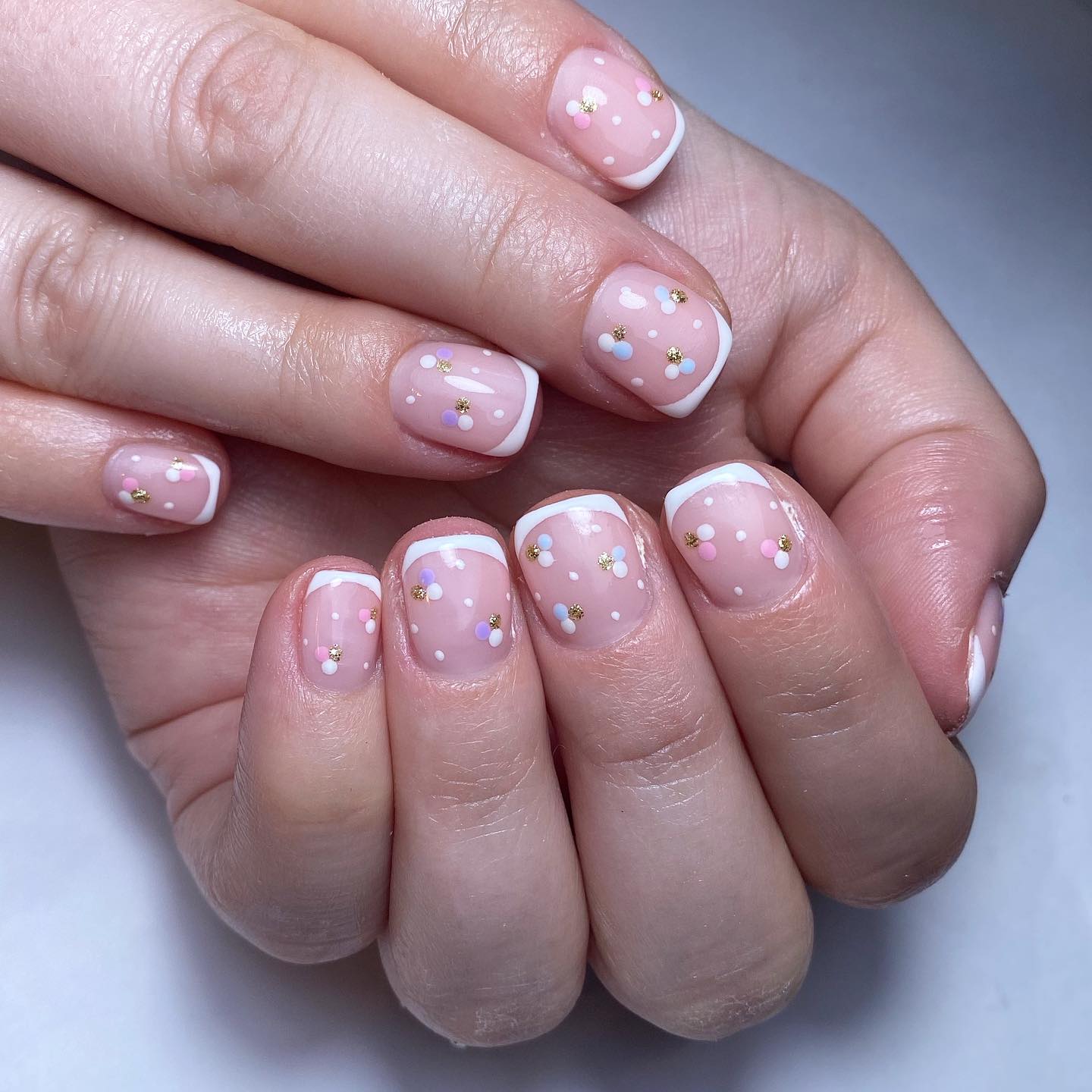 Nude French Tip Nails with Floral Accents