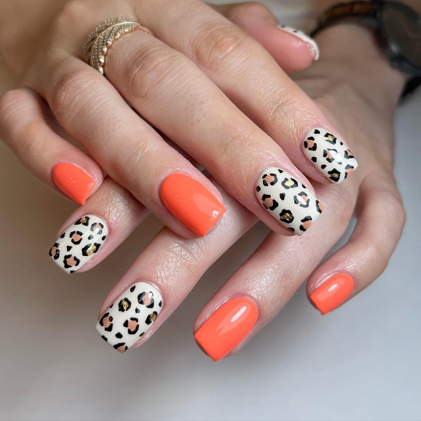 Stylish Orange and Animal Print Nails