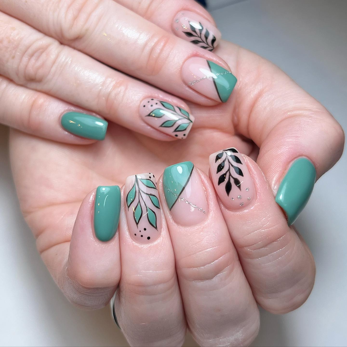 Artistic Green Nail Design