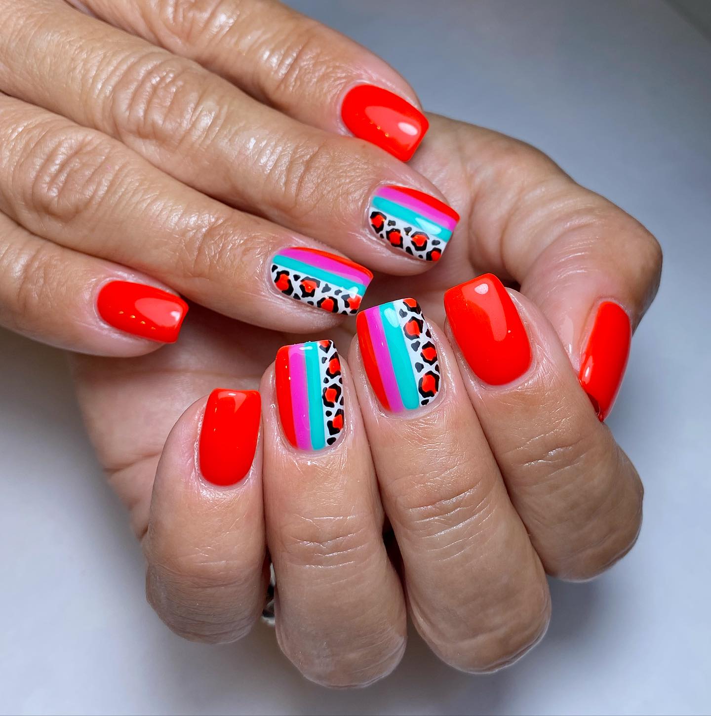 Vibrant Red and Colorful Nail Art
