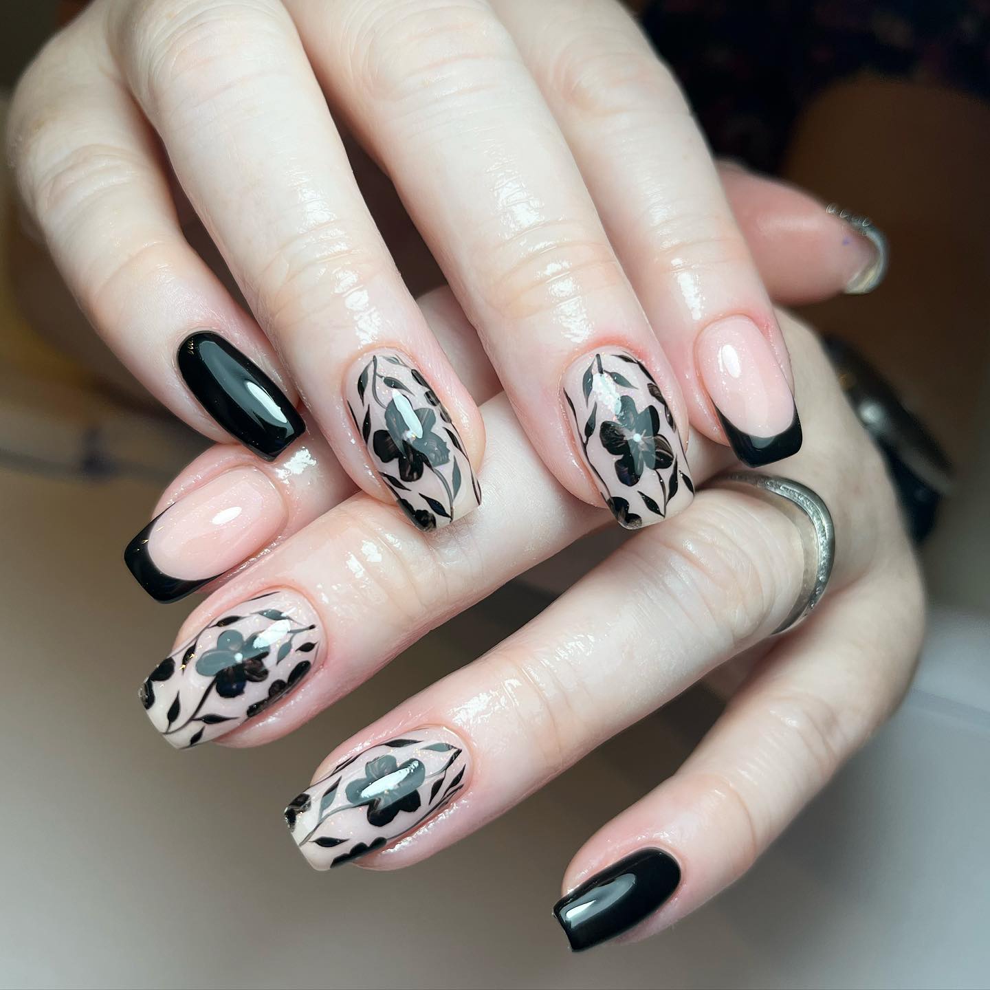 Artistic Floral Black and Nude Nails